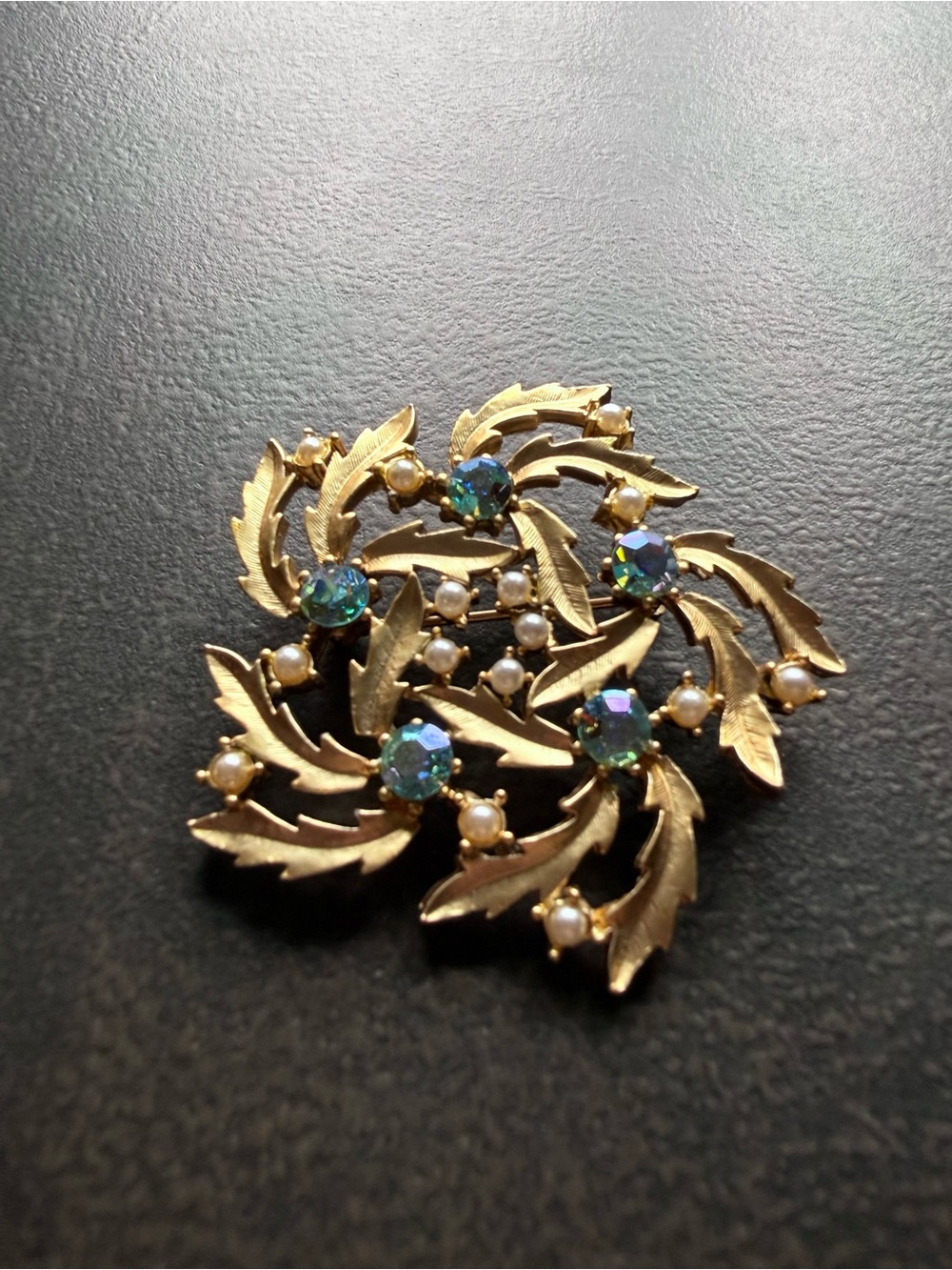 Gold-tone Floral Swirl Brooch with Green Aurora Borealis Stones and Pearls